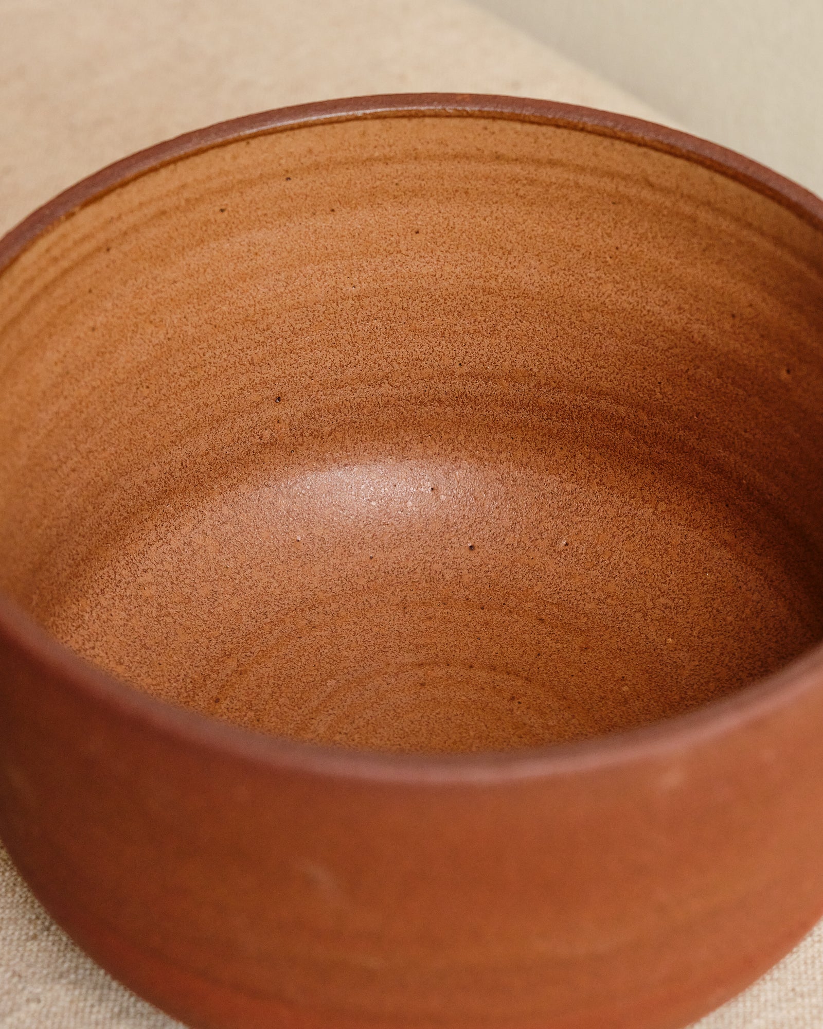 Close-up of a terracotta pot with a smooth interior surface.